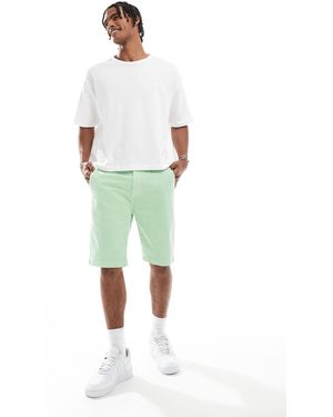 Superdry – vintage international – shorts - Grün